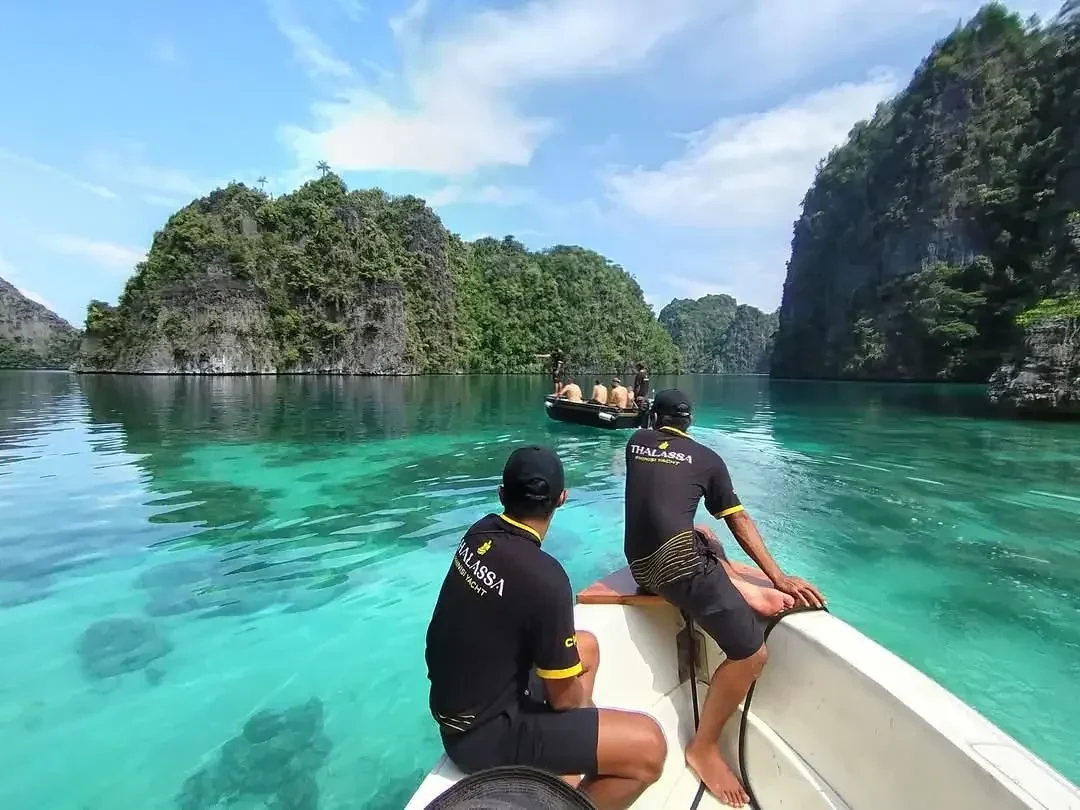 Uncharted Cruises team exploring a remote dive site in the eastern Indonesian archipelago by private yacht charter.